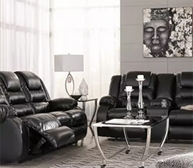 ASHLEY VACHERIE BLACK RECLINING SOFA AND LOVESEAT